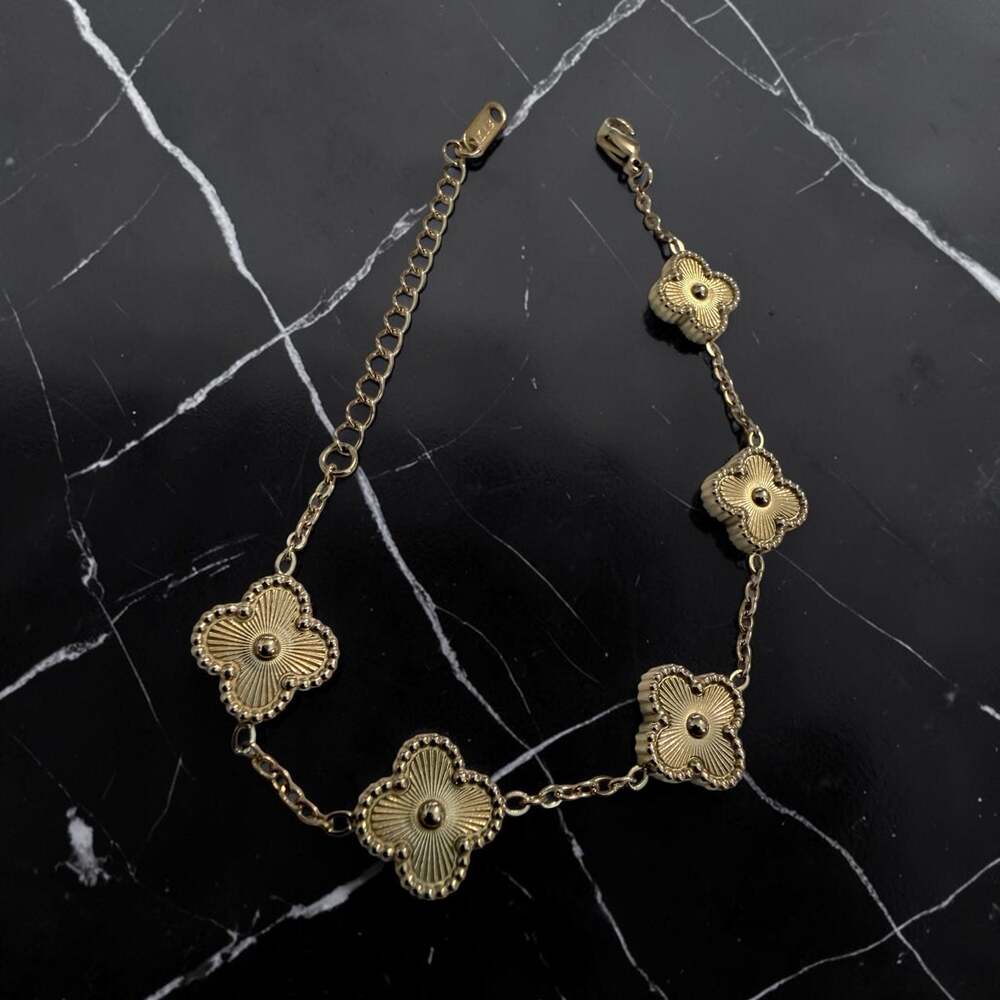 Clover Motif Charm Bracelet in Gold Tone